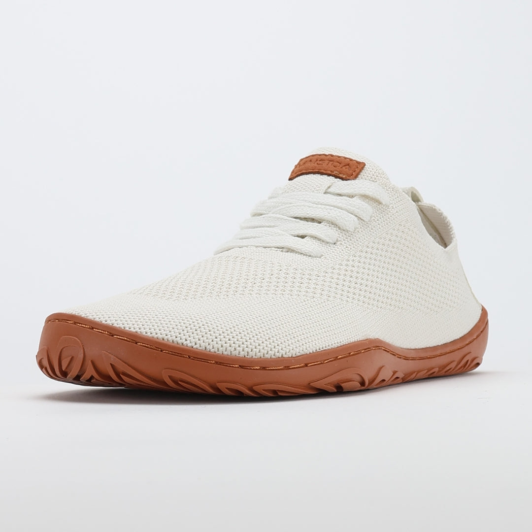 vaistoa_iloa_paljasjalkakengat_kangastennarit_luonnonvalkoinen_terracottalla_pohjalla_etuviisto_yksi_kenka