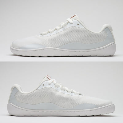 Vaistoa Tahto valkoiset paljasjalkasalikengät kuvattuna molemmilta sivuilta, esillä kengän leveä jalkaterän muoto, tasainen pohja ilman kantakorkoa ja joustava rakenne.