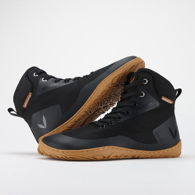 vaistoa tuohi paljasjalkaretkeilykengät mustat asettelu nojaa toisen varteen